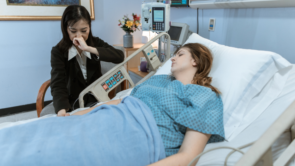 A person lying in a hospital bed