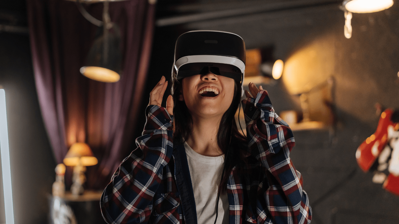 a person holding a virtual reality headset