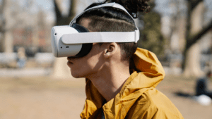 a person wearing a virtual reality headset in the park