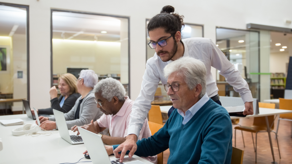 a person working on a laptop in a library