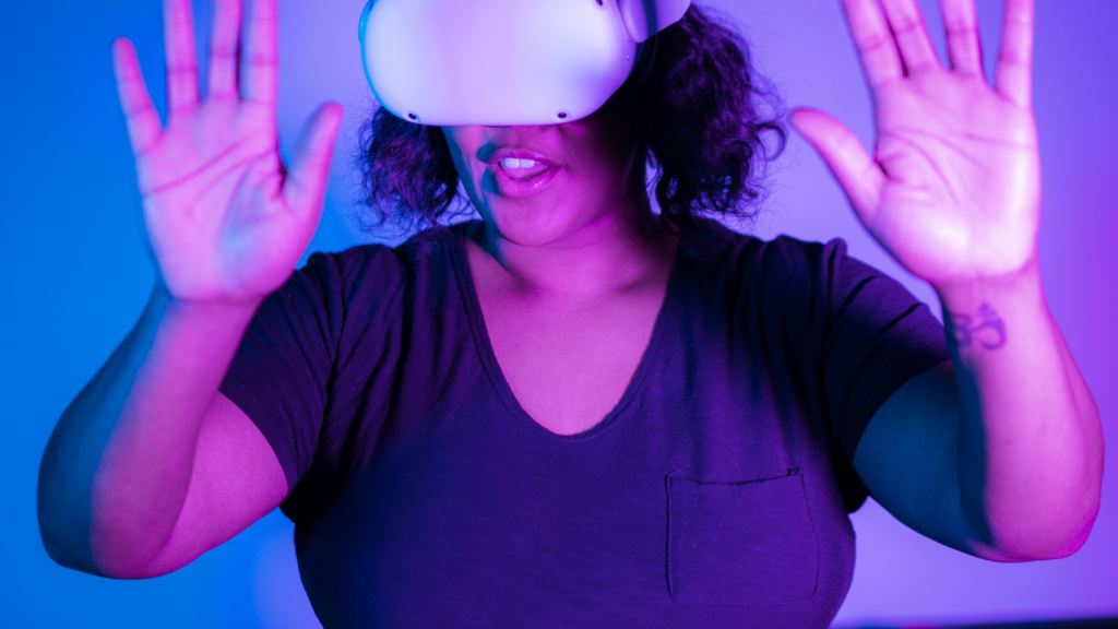 a person wearing a virtual reality headset in neon background