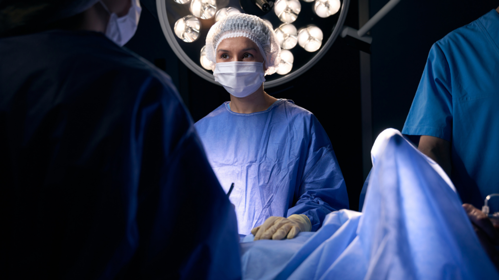 surgeons working in an operating room